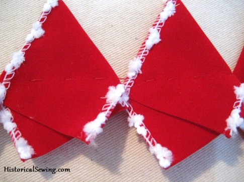 Running stitch in triangle petals