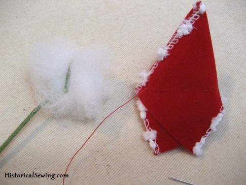 Gathering stitch in bud and creating stuffing puff