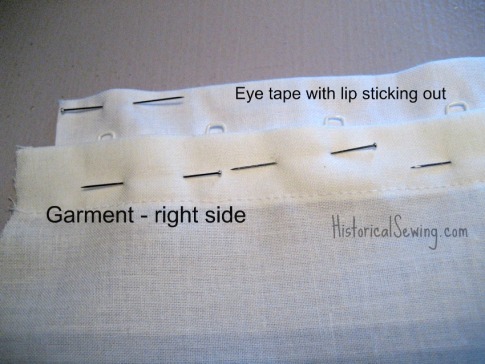 Eye tape pinned to garment