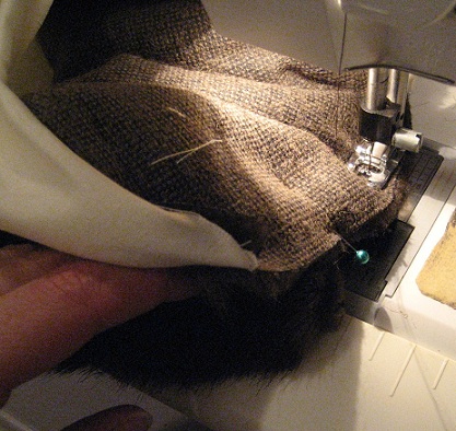 Sewing and pinning the fur pieces