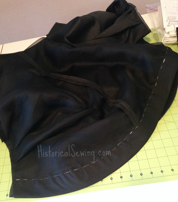 Overskirt front panels finished with hem facing