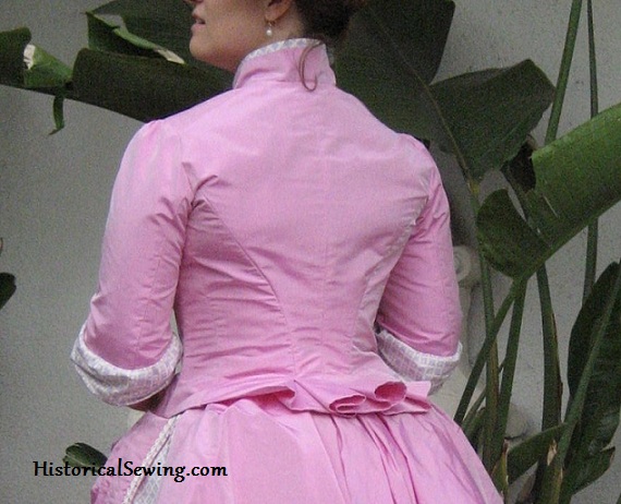 1886 Pink bodice back with tail pleats