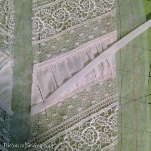 1880 Vanilla Dressing Gown|Pinning bias tape over fabric puff